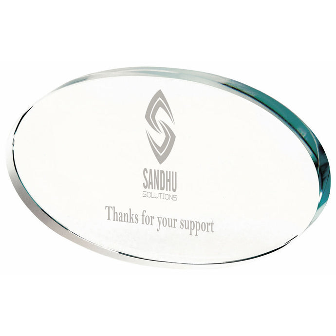 Oval Crystal Paperweight Engraved. Thickness 15mm. Supplied in Presentation Case.